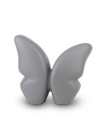 Pequena urna borboleta em cerâmica feita à mão, cinza